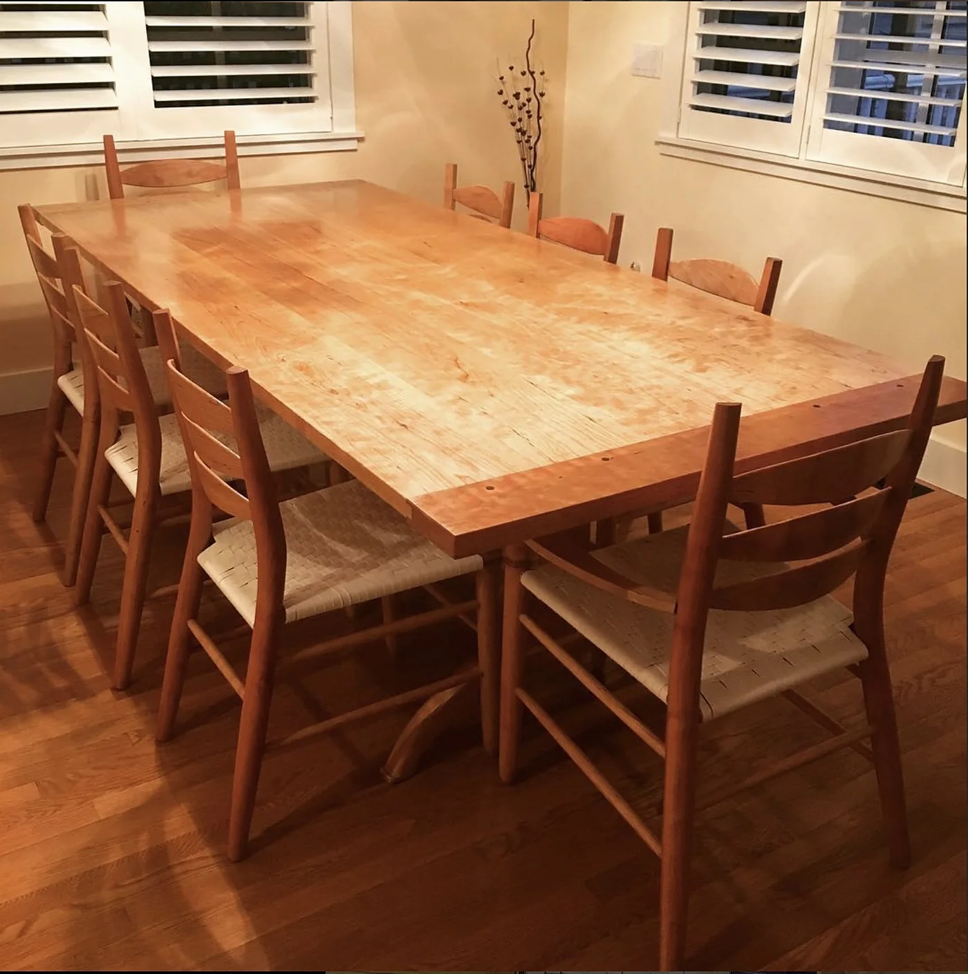 Handcrafted custom dining table and chairs built by Rew Construction in Harrison, ID