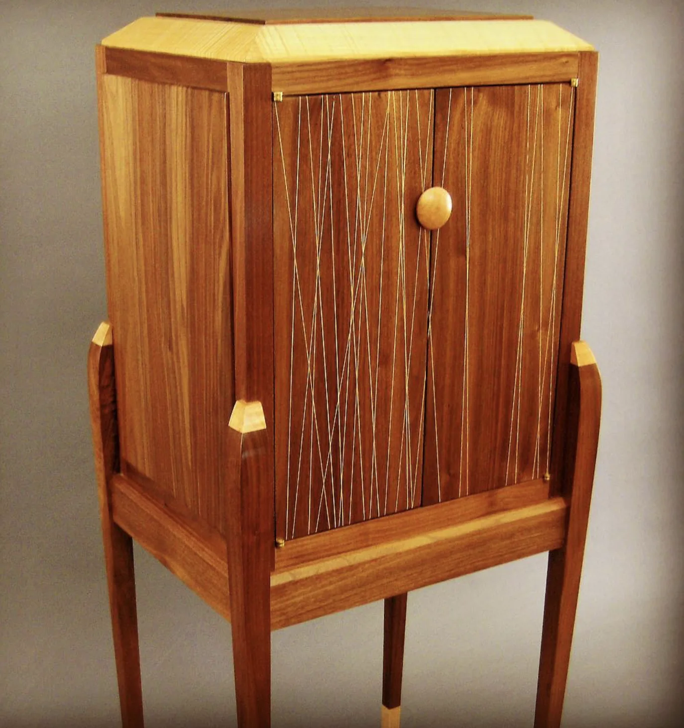 Walnut cabinet on stand with string inlay doors, fine studio furniture by Curtis Rew